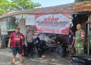 Bhabinkamtibmas Polsek Rappocini Sosialisasikan Call Center 110 dan Pasang Spanduk Imbauan Kamtibmas